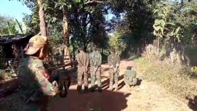 A junta soldier is seen executing captured PNLA troops in a screenshot from a video shared online on June 1